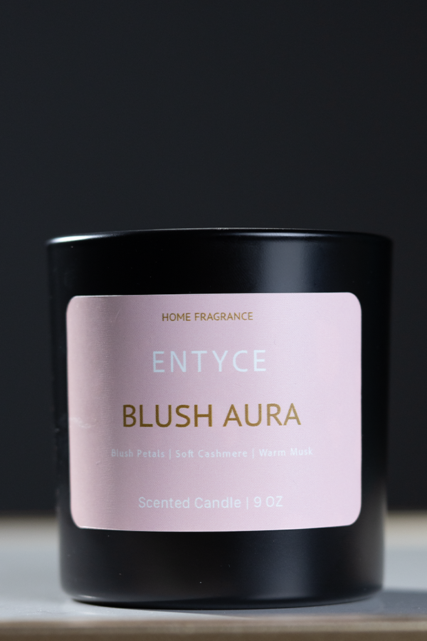 Blush Aura 9 oz scented candle in a black glass jar