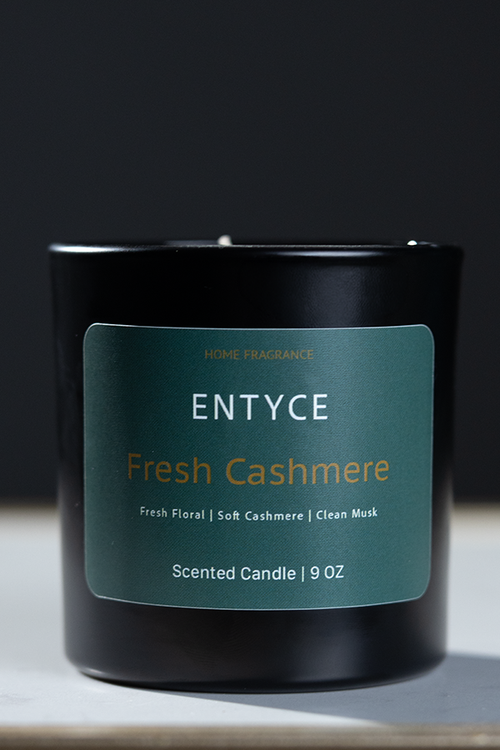 Fresh Cashmere 9 oz scented candle in a black glass jar